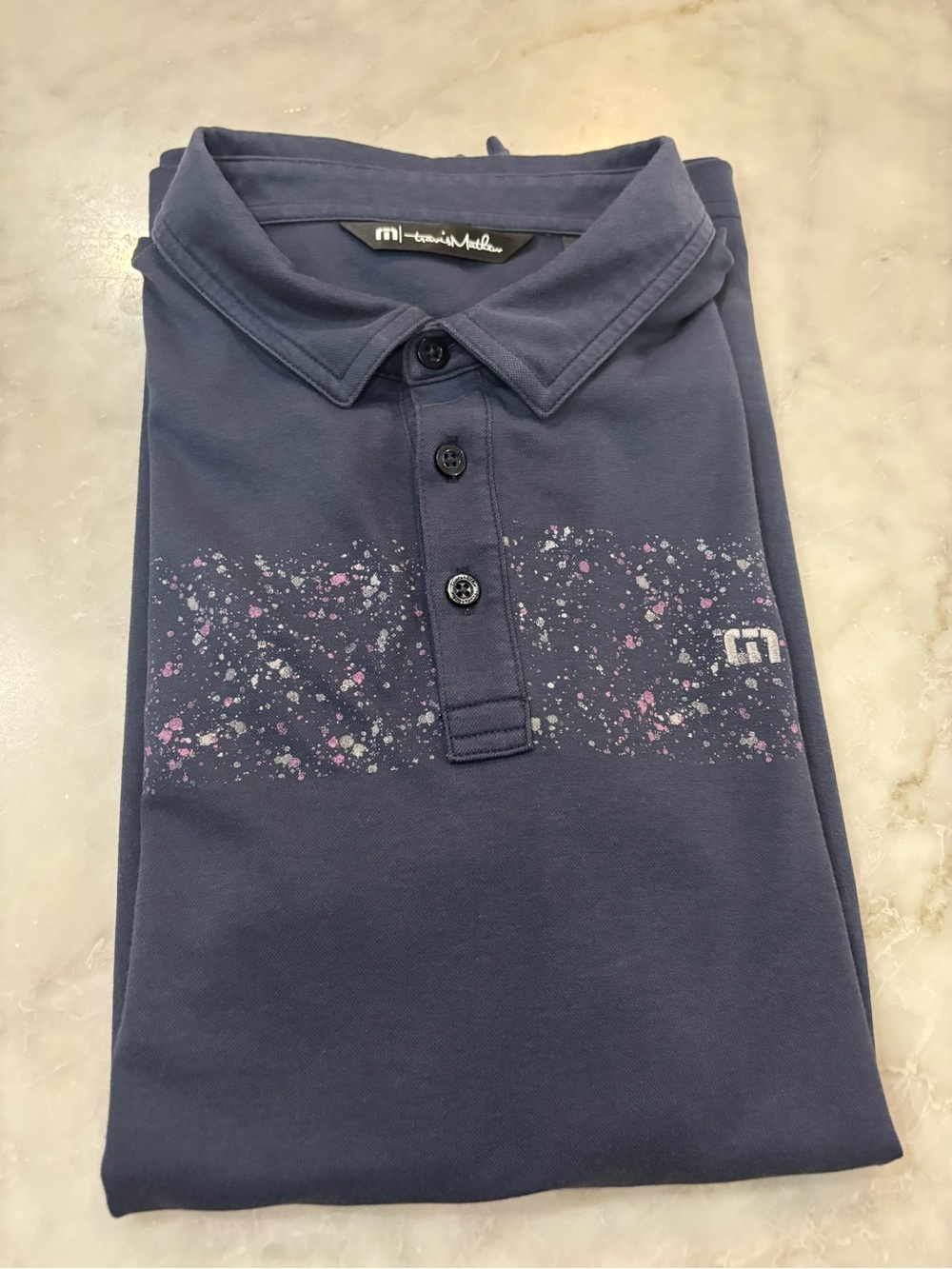 Travis Mathew Navy Polo with White & Pink Speckle Print